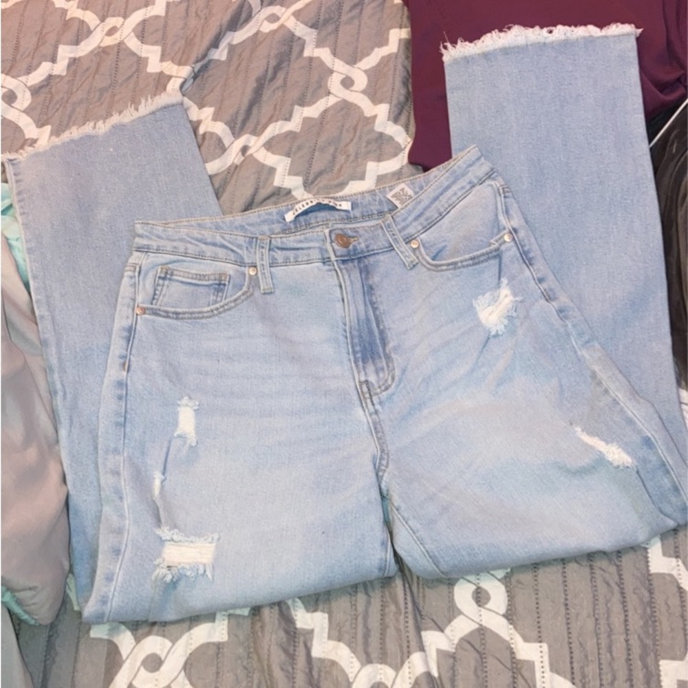 Celebrity pink ripped jeans
